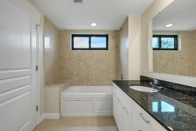 300 S Duval St Unit 612, Tallahassee, FL 32301 - full bath with vanity, plenty of natural light, washtub / shower combination, and tile patterned flooring