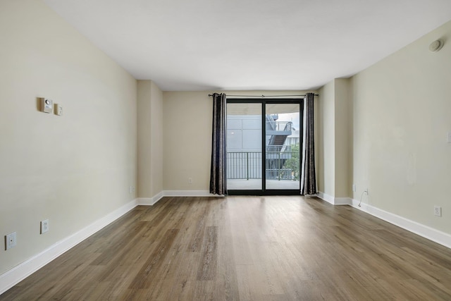 300 S Duval St Unit 612, Tallahassee, FL 32301 - empty room with wood finished floors and a smoke detector