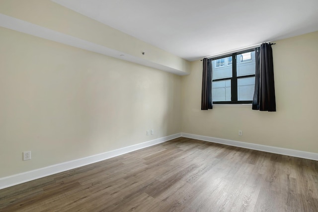 300 S Duval St Unit 612, Tallahassee, FL 32301 - empty room featuring wood finished floors and baseboards