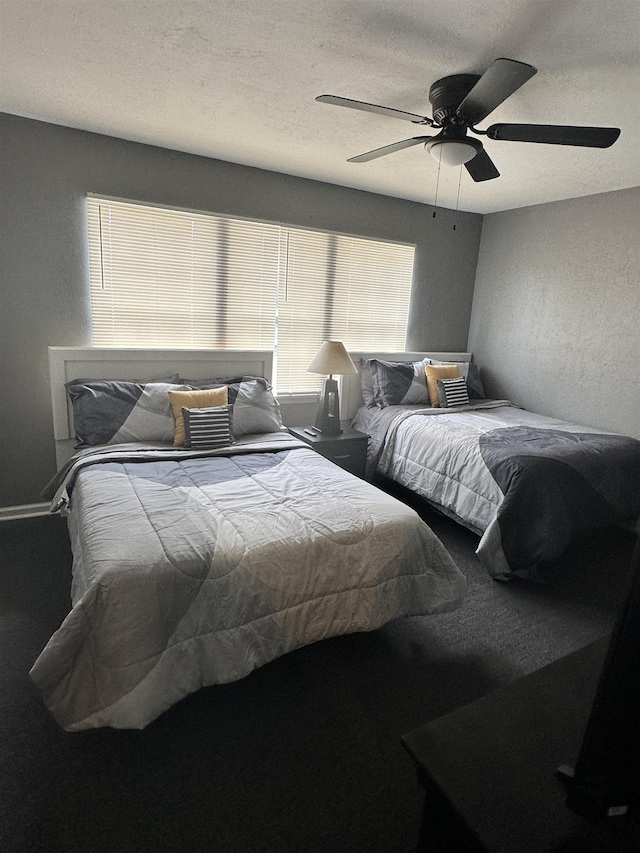 1216 Hidden Pl, Tallahassee, FL 32304 - bedroom with a textured ceiling, a ceiling fan, and a textured wall