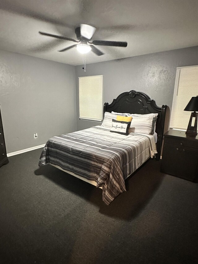 1216 Hidden Pl, Tallahassee, FL 32304 - carpeted bedroom with baseboards and ceiling fan