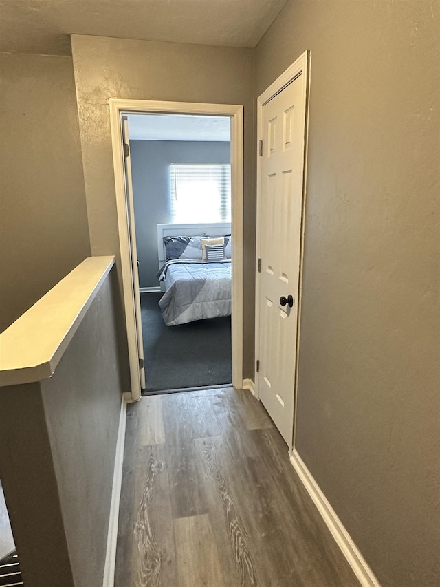 1216 Hidden Pl, Tallahassee, FL 32304 - corridor featuring wood finished floors and baseboards