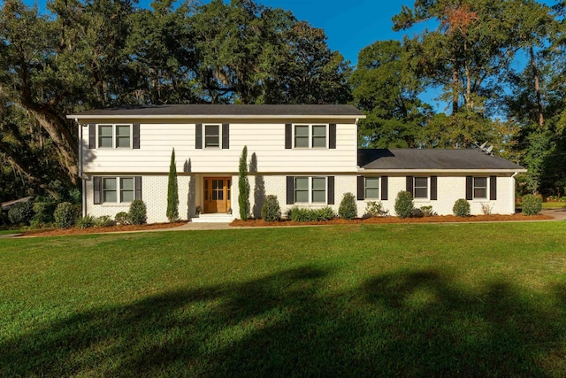 view of front of home with a front lawn