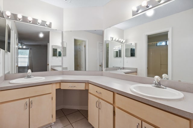 bathroom featuring tile patterned floors and vanity