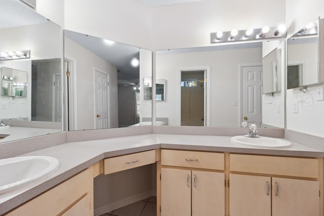 bathroom with vanity, tile patterned floors, and ceiling fan