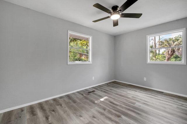 2124 Berkshire Dr, Tallahassee, FL 32304 - spare room featuring a ceiling fan, baseboards, and wood finished floors