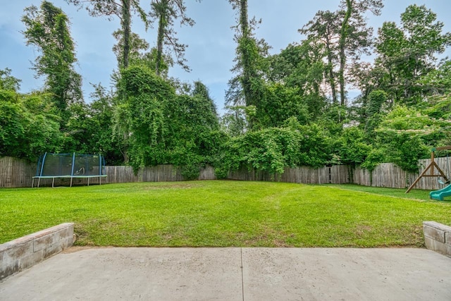 2310 Don Andres Ave, Tallahassee, FL 32304 - view of yard with a trampoline, a patio area, and a playground