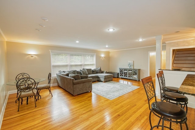 2310 Don Andres Ave, Tallahassee, FL 32304 - living room featuring ornamental molding, light wood-style flooring, baseboards, recessed lighting, and decorative columns