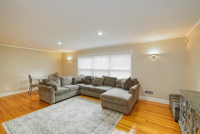 2310 Don Andres Ave, Tallahassee, FL 32304 - living room with crown molding, light wood-style floors, baseboards, and recessed lighting