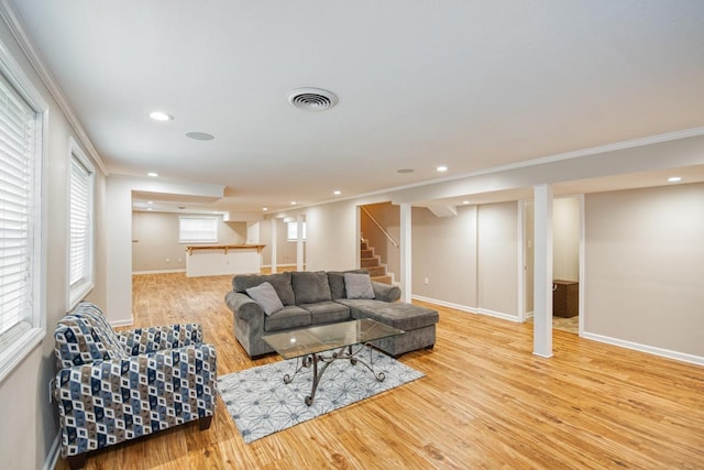 2310 Don Andres Ave, Tallahassee, FL 32304 - living area with wood finished floors, recessed lighting, baseboards, ornamental molding, and stairway