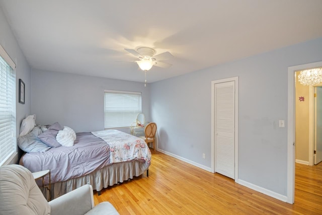 2310 Don Andres Ave, Tallahassee, FL 32304 - bedroom featuring multiple windows, baseboards, light wood-style floors, and ceiling fan