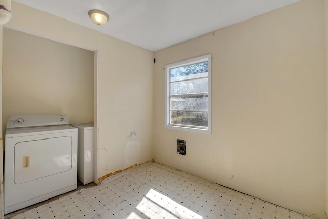 clothes washing area featuring washing machine and dryer