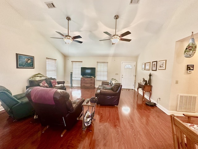 living room with ceiling fan, hardwood / wood-style floors, and high vaulted ceiling