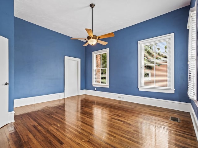 unfurnished room featuring ceiling fan and wood-type flooring