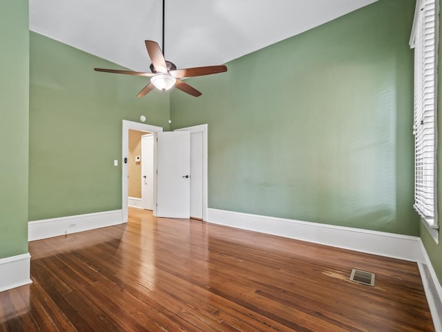 empty room featuring wood-type flooring and ceiling fan