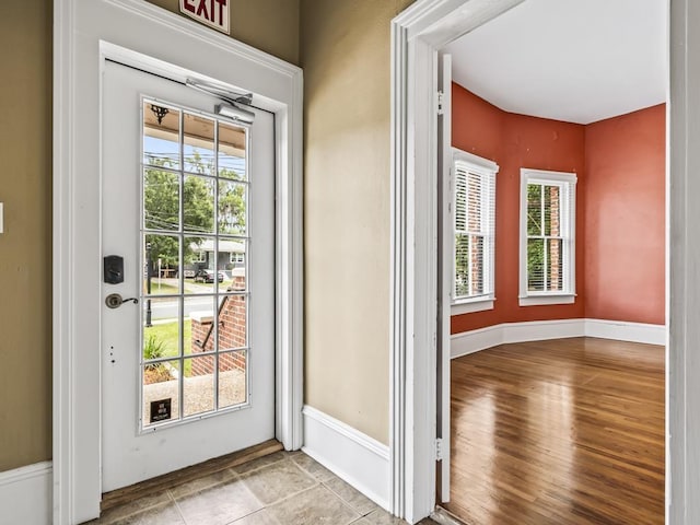 entryway featuring light hardwood / wood-style floors and a wealth of natural light