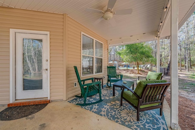 view of patio featuring a ceiling fan