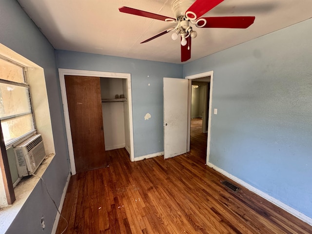 1402 W Tharpe St, Tallahassee, FL 32303 - unfurnished bedroom with wood finished floors, a closet, and a ceiling fan