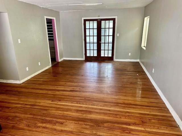 1402 W Tharpe St, Tallahassee, FL 32303 - unfurnished room featuring french doors and wood-type flooring