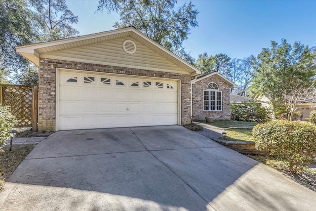 ranch-style house featuring a garage, concrete driveway, and brick siding