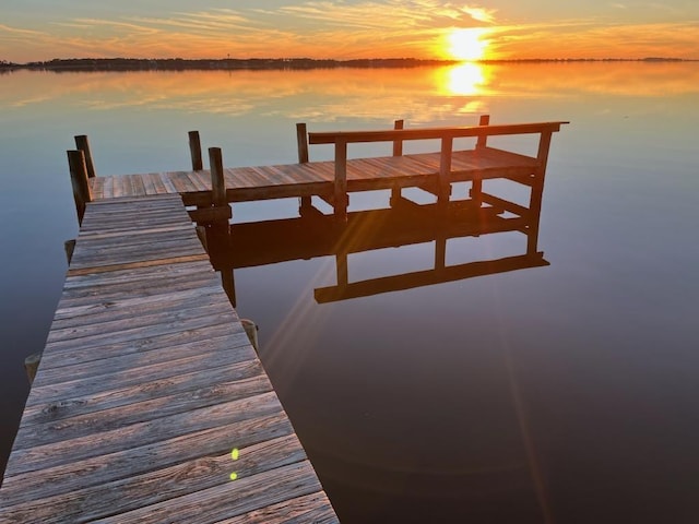 view of dock with a water view