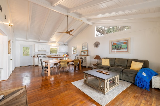 living room featuring ceiling fan, dark hardwood / wood-style floors, high vaulted ceiling, and beam ceiling