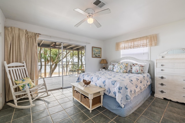 bedroom featuring ceiling fan and access to outside