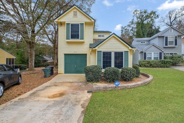 traditional home featuring a front lawn, an attached garage, and driveway