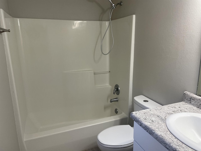 full bathroom featuring vanity, shower / bathing tub combination, and toilet