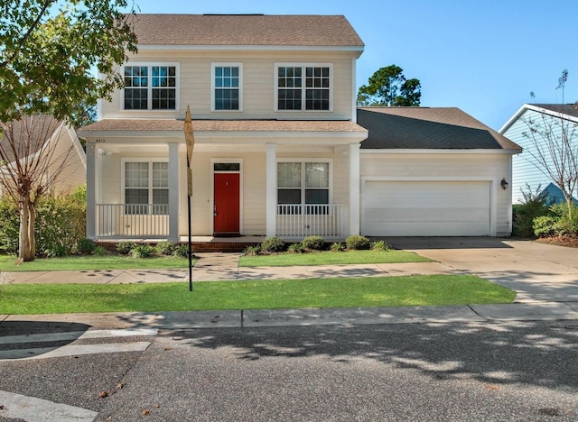 view of front of home with covered porch and a garage