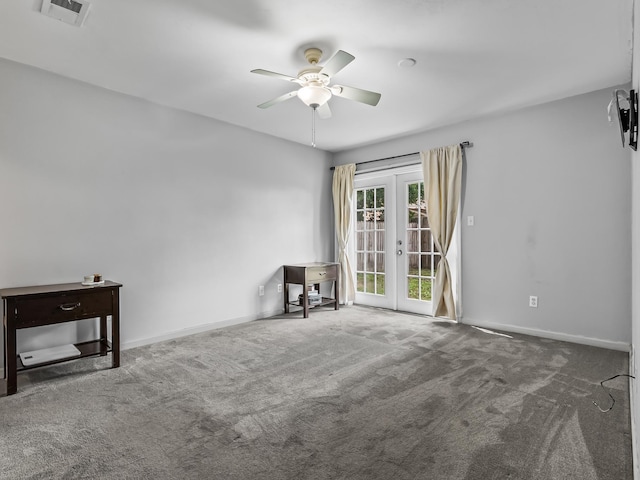 31 Sioux Trl, Crawfordville, FL 32327 - carpeted spare room featuring french doors and a ceiling fan