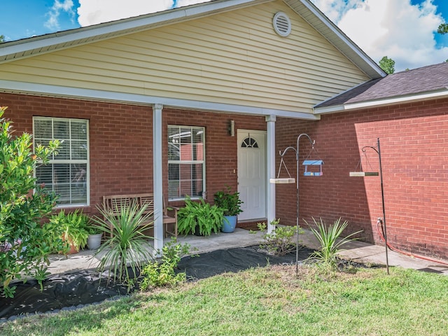 31 Sioux Trl, Crawfordville, FL 32327 - view of front of property with brick siding and covered porch