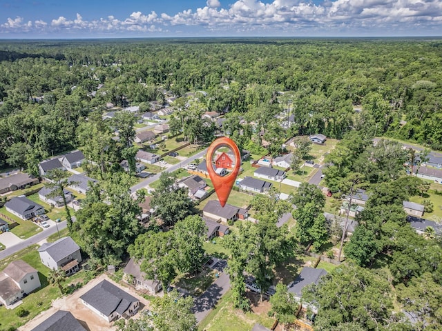 31 Sioux Trl, Crawfordville, FL 32327 - aerial view of property and surrounding area featuring a heavily wooded area and nearby suburban area