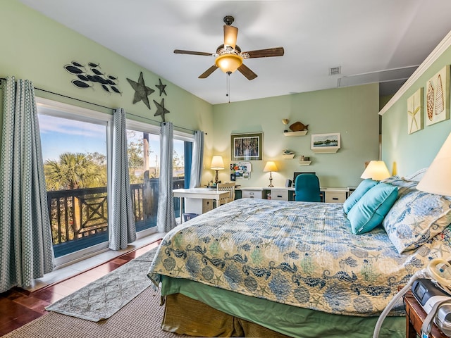 bedroom with hardwood / wood-style flooring, access to outside, and ceiling fan