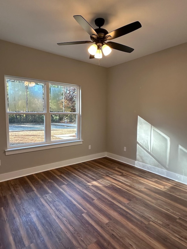2725 Masterson Ln, Tallahassee, FL 32311 - empty room with dark wood-style floors, baseboards, and a ceiling fan