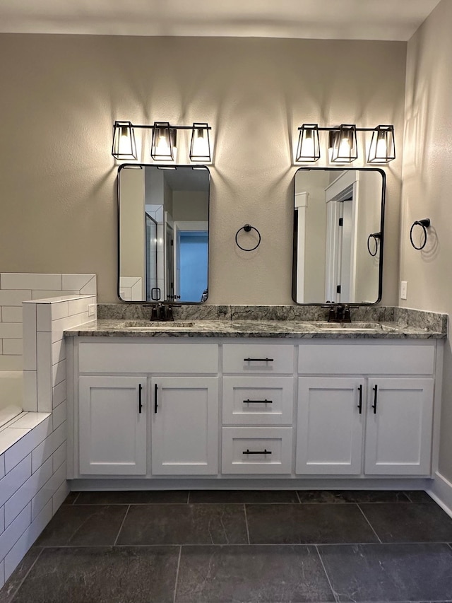 2725 Masterson Ln, Tallahassee, FL 32311 - bathroom featuring double vanity and a sink