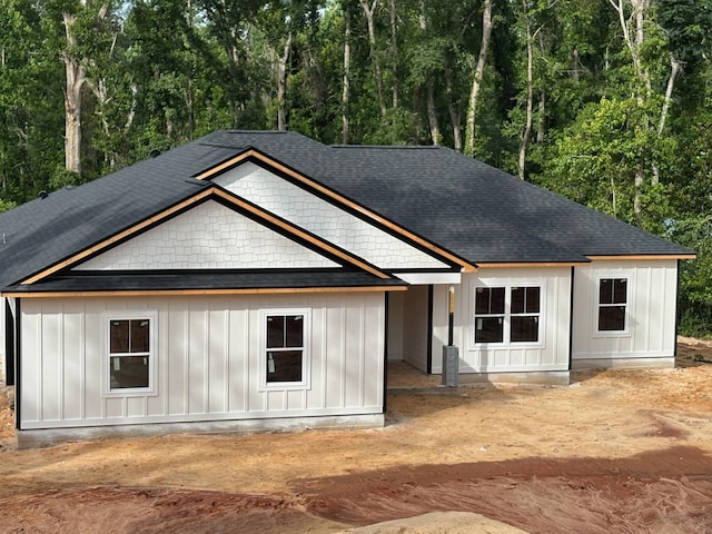 2725 Masterson Ln, Tallahassee, FL 32311 - view of front of property with board and batten siding and a shingled roof