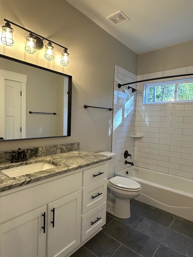 2725 Masterson Ln, Tallahassee, FL 32311 - full bath with visible vents, vanity, toilet, and bathing tub / shower combination