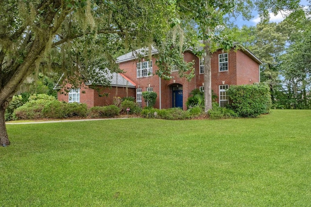 332 Winnstead Ct, Tallahassee, FL 32312 - view of front of home featuring a front lawn and brick siding