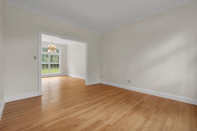 332 Winnstead Ct, Tallahassee, FL 32312 - spare room featuring a chandelier, crown molding, and light wood-style floors