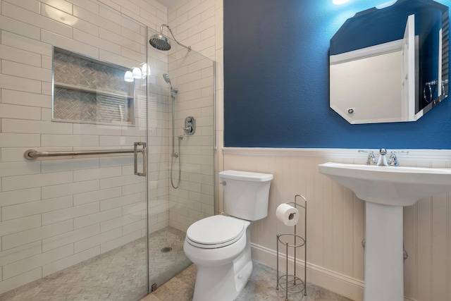 332 Winnstead Ct, Tallahassee, FL 32312 - bathroom featuring a shower stall and a wainscoted wall