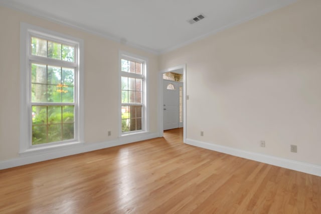 332 Winnstead Ct, Tallahassee, FL 32312 - spare room with light wood-style flooring and crown molding