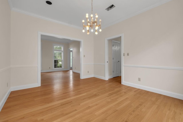 332 Winnstead Ct, Tallahassee, FL 32312 - empty room with a chandelier, ornamental molding, and light wood-style flooring