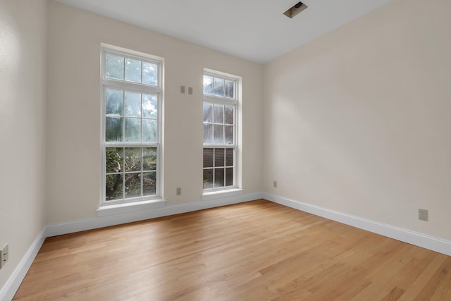332 Winnstead Ct, Tallahassee, FL 32312 - spare room featuring light wood-type flooring and baseboards