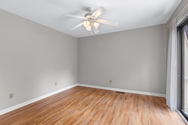 unfurnished room featuring ceiling fan and light hardwood / wood-style flooring