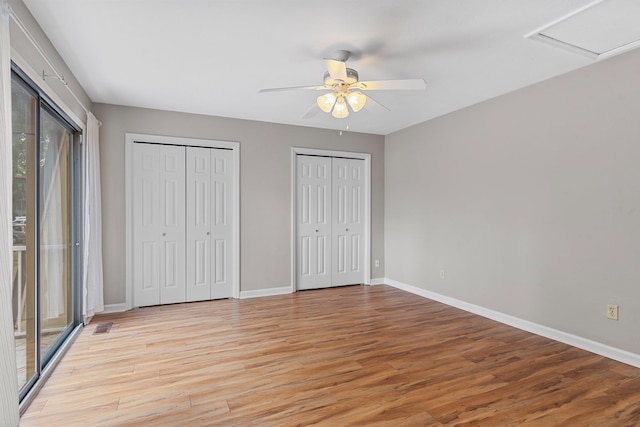 unfurnished bedroom with access to outside, ceiling fan, and light wood-type flooring