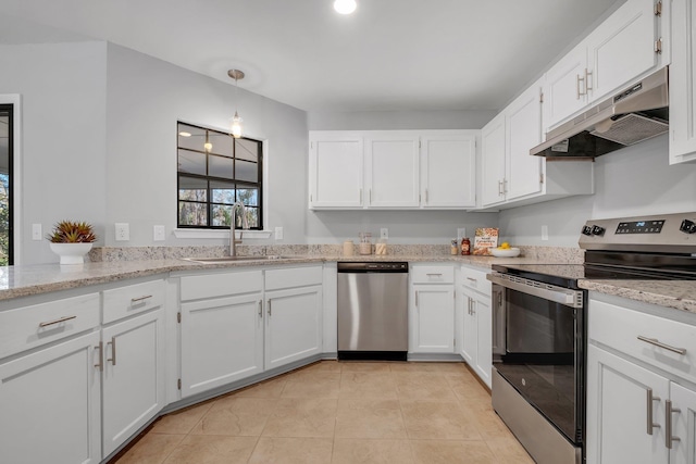 kitchen featuring light stone counters, under cabinet range hood, a sink, white cabinetry, and appliances with stainless steel finishes