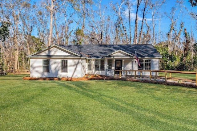 ranch-style house featuring a front lawn