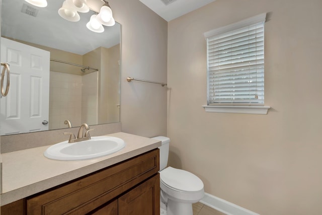 full bath featuring baseboards, visible vents, toilet, walk in shower, and vanity