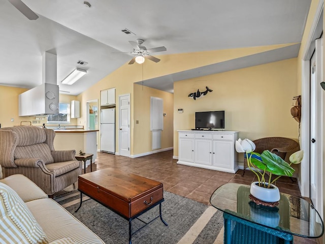 living room featuring tile patterned flooring, vaulted ceiling, and ceiling fan